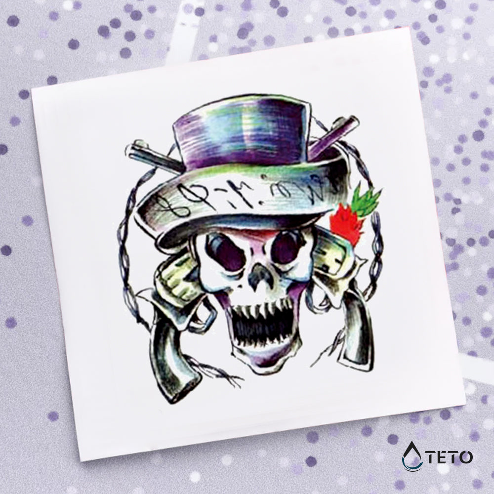 Calavera con pistolas